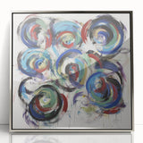 Framed abstract wall art featuring colorful splatters in silver acrylic, ideal for modern decor. Perfect for adding a vibrant touch to living spaces or galleries.