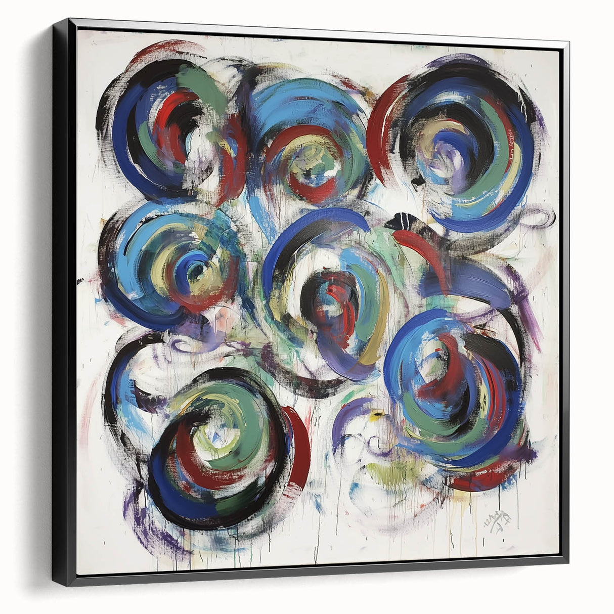 Framed canvas artwork displaying abstract splatters in vibrant colors, set against a sleek black frame, showcasing a modern artistic style ideal for contemporary decor.
