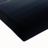 Large art featuring a black and white landscape painting of various food dishes on stretched canvas.