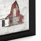 Close-up of a framed canvas wall art piece depicting a serene landscape with a rustic barn and vibrant greenery, perfect for home decor. Ideal for enhancing country-themed interiors.