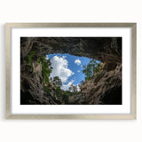 Framed landscape print showcasing vibrant canyons in rich earthy tones, featuring a sleek silver mat, perfect for enhancing home decor aesthetics. Ideal for nature lovers and art enthusiasts.