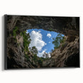 Framed canvas artwork showcasing a stunning landscape of canyons, with a sleek black frame, perfect for enhancing home decor with natural beauty.