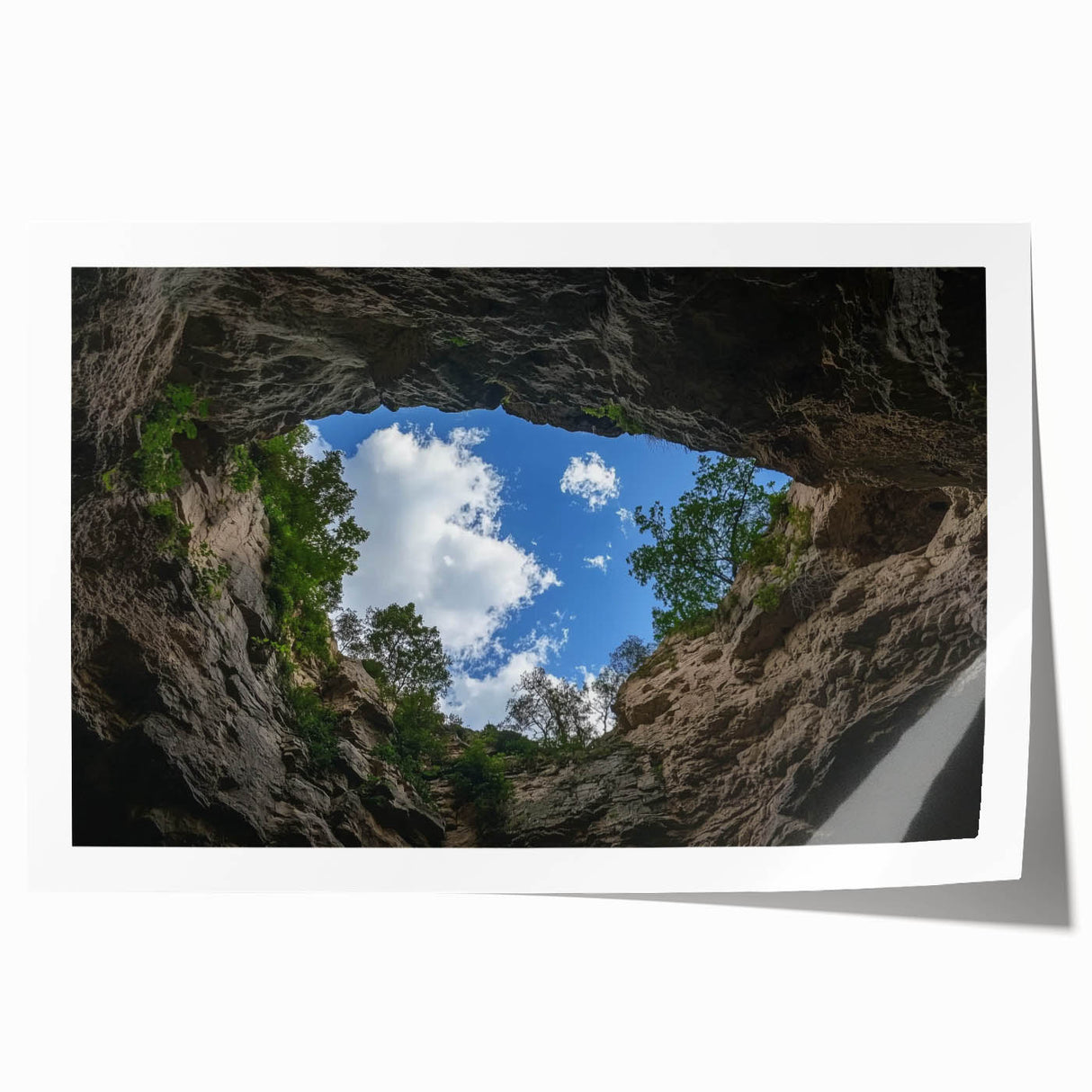 Vibrant landscape print showcasing majestic canyons in rich earth tones, rolled for easy transport and display, perfect for home decor enthusiasts.