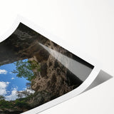 Vibrant landscape print of canyons showcasing rich earth tones and dramatic rock formations, rolled for easy transport and display in various settings.