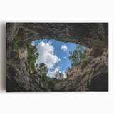 Stretched canvas artwork showcasing a vibrant landscape of canyons at sunset, featuring rich earthy tones and dramatic skies, perfect for home decor enhancement.