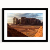 Framed landscape artwork showcasing a desert scene with vibrant colors and a black mat, ideal for modern home decor or office settings, adding a touch of nature.