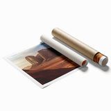 Desert landscape print showcasing vibrant orange and yellow hues, rolled for easy shipping in a protective cardboard tube, ideal for home decor.