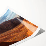 Vibrant rolled print showcasing a stunning desert landscape with warm hues of orange and yellow, elegantly packaged in a durable tube for safe transport and display.
