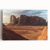 Vibrant desert landscape stretched canvas featuring warm hues of orange and yellow, depicting a serene sunset with silhouetted cacti, ideal for home decor.