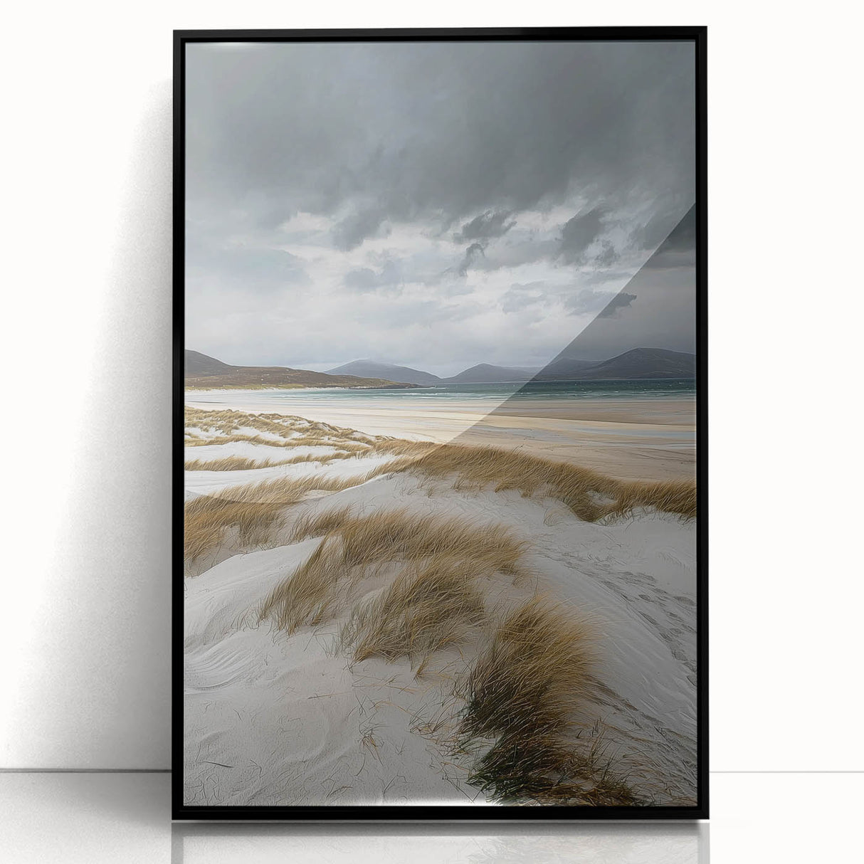 Framed acrylic wall art showcasing a serene landscape of rolling sand dunes, featuring a sleek black frame that adds elegance to any decor. The image captures soft, warm hues of the dunes under a clear blue sky, creating a tranquil atmosphere ideal for living spaces or offices.