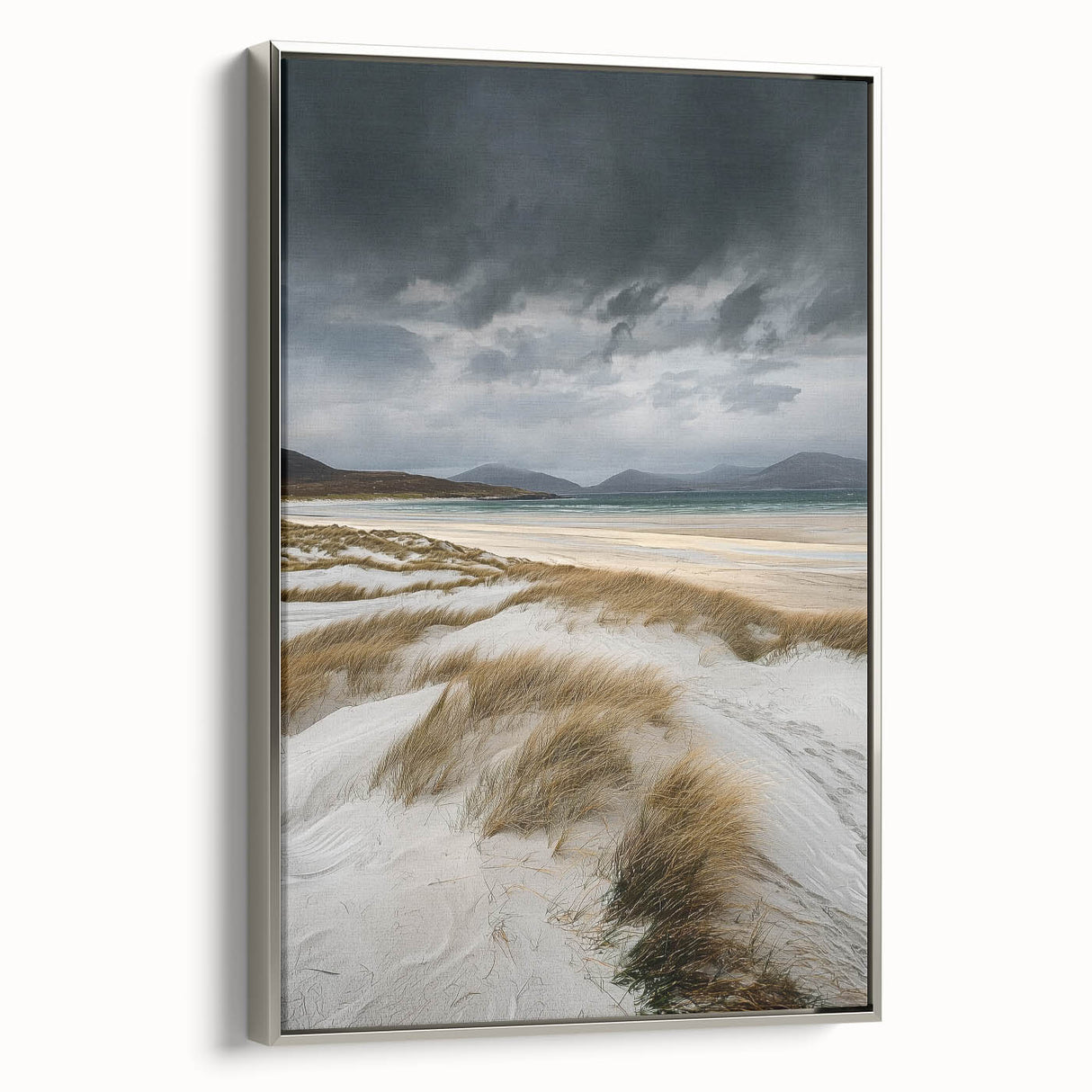 Framed canvas artwork depicting serene sand dunes in a landscape setting, showcased with a sleek silver frame, perfect for modern home decor.