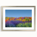 Elegant silver frame showcasing a landscape print of vibrant green fields, accented with a white mat for a refined display, ideal for home decor and interior styling.