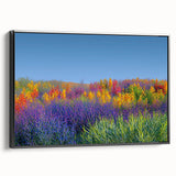 Framed canvas artwork depicting serene landscapes with vibrant green fields and a black frame, showcasing an elegant side view suitable for home decor.