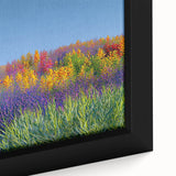 Close-up of a framed canvas showcasing vibrant landscape fields, featuring lush green hues and golden sunlight, perfect for home decor and nature enthusiasts.