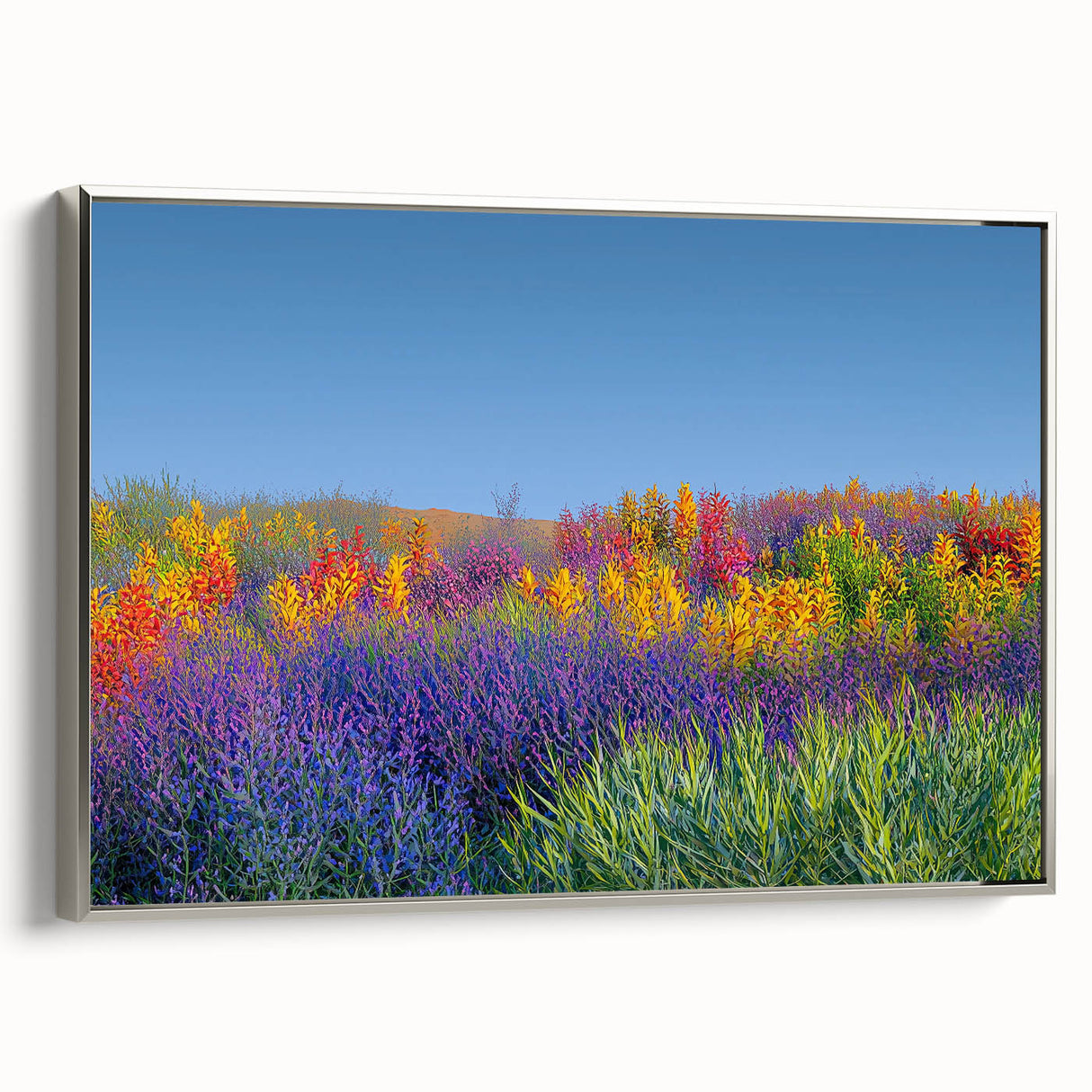 Framed canvas artwork depicting serene landscapes with vibrant fields and a silver frame, showcasing a modern decor style ideal for home or office interiors.