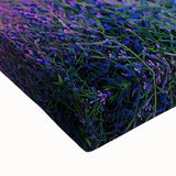 Close-up of a stretched canvas showcasing a vibrant landscape design with rolling green fields and a clear blue sky, perfect for home decor or art enthusiasts.