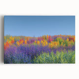 Stretched canvas artwork showcasing a vibrant landscape of rolling fields under a clear blue sky, perfect for enhancing home decor with nature-inspired aesthetics.