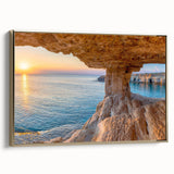 Framed canvas wall art depicting a vintage-style landscape of Cyprus with muted gold and black tones.