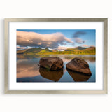 Extra large abstract art print of Cumbria, England, in muted earth tones on a textured canvas, framed in silver.