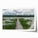 Extra large rolled print depicting a serene Estonian landscape with vibrant greenery and a calm lake.