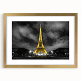 Abstract art print of Paris scenery in muted gray and gold tones on a framed canvas, suitable for dining room decor.