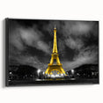 Black and white wall art featuring a vintage poster art style landscape of Paris on framed canvas.