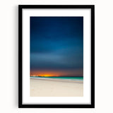 Colorful abstract art print of Yucatan scenery in vibrant hues on a large textured canvas, framed in black.