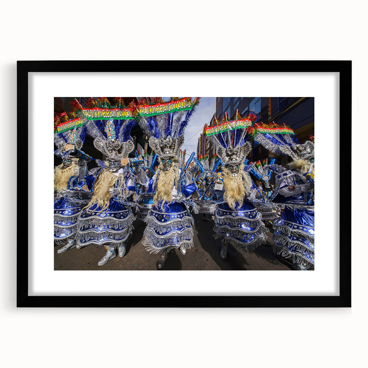 Extra large abstract art print of a textured, colorful Bolivian landscape on a framed black mat, ideal for living room decor.