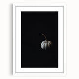 Abstract art print of autumn trees in orange and red tones on a white framed canvas, suitable for dining room decor.