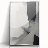 Framed abstract minimalist wall art featuring a sleek design with silver accents, displayed in an elegant setting, perfect for modern home decor.