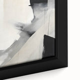 Close-up view of a framed canvas displaying abstract minimalist wall art, featuring soft earth tones and geometric shapes, perfect for modern home decor.