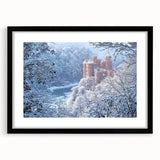 Elegant black-framed landscape artwork depicting a majestic castle surrounded by serene nature, featuring a white mat for a refined presentation, ideal for home decor.