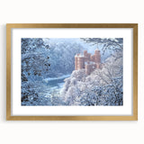 Elegant gold-framed landscape artwork featuring a serene castle scene, highlighted by intricate matting, perfect for enhancing home decor with a touch of sophistication.
