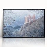 Framed acrylic artwork of a majestic castle landscape, featuring vibrant colors and intricate details, presented in a sleek black frame for elegant display.