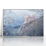 Framed acrylic landscape artwork showcasing a serene castle scene surrounded by lush greenery, presented in a sleek white frame for a modern touch. Perfect for home decor enthusiasts.