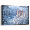 Framed canvas artwork showcasing a stunning landscape with a majestic castle, presented in a sleek black frame, ideal for home or office decor.