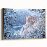 Framed canvas artwork displaying a picturesque landscape with a castle, elegantly bordered in gold, showcasing intricate details and vibrant colors, perfect for home decor.