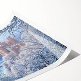 Rolled print showcasing a picturesque landscape with a majestic castle set against a vibrant sky, elegantly packaged in a durable cardboard tube for safe shipping.