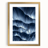 Gold-framed landscape artwork featuring a cave scene with a mat, highlighting intricate details and vibrant colors, perfect for home decor or art enthusiasts.