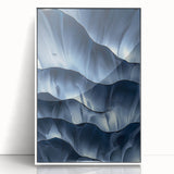 Framed acrylic artwork showcasing a stunning landscape of caves, featuring vibrant colors and intricate details, displayed in a sleek white frame to enhance any decor.