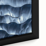 Close-up of a framed canvas artwork depicting a vibrant landscape with intricate caves, showcasing rich colors and textures, perfect for home decor.