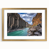 Framed landscape artwork showcasing dramatic cliffs with a gold mat, perfect for enhancing home decor. Ideal for nature lovers seeking elegant wall accents.