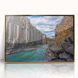 Framed acrylic artwork showcasing a stunning landscape with dramatic cliffs and a golden hue, ideal for enhancing modern home decor.