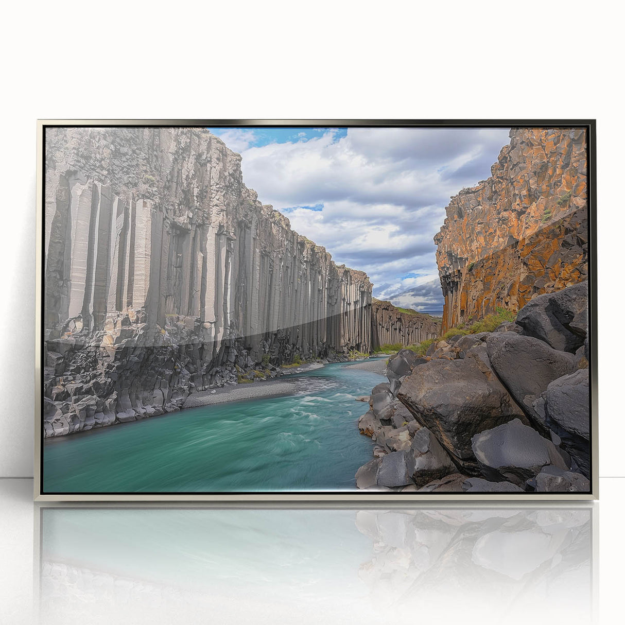 Framed acrylic artwork of a dramatic coastal cliff landscape, showcasing vibrant blue skies and rugged cliffs, ideal for enhancing modern home decor.