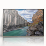 Framed acrylic artwork of a dramatic coastal cliff landscape, showcasing vibrant blue skies and rugged cliffs, ideal for enhancing modern home decor.