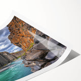 Stunning rolled print showcasing a vibrant landscape of majestic cliffs under a clear blue sky, perfect for home decor or art enthusiasts, securely packaged in a protective tube.