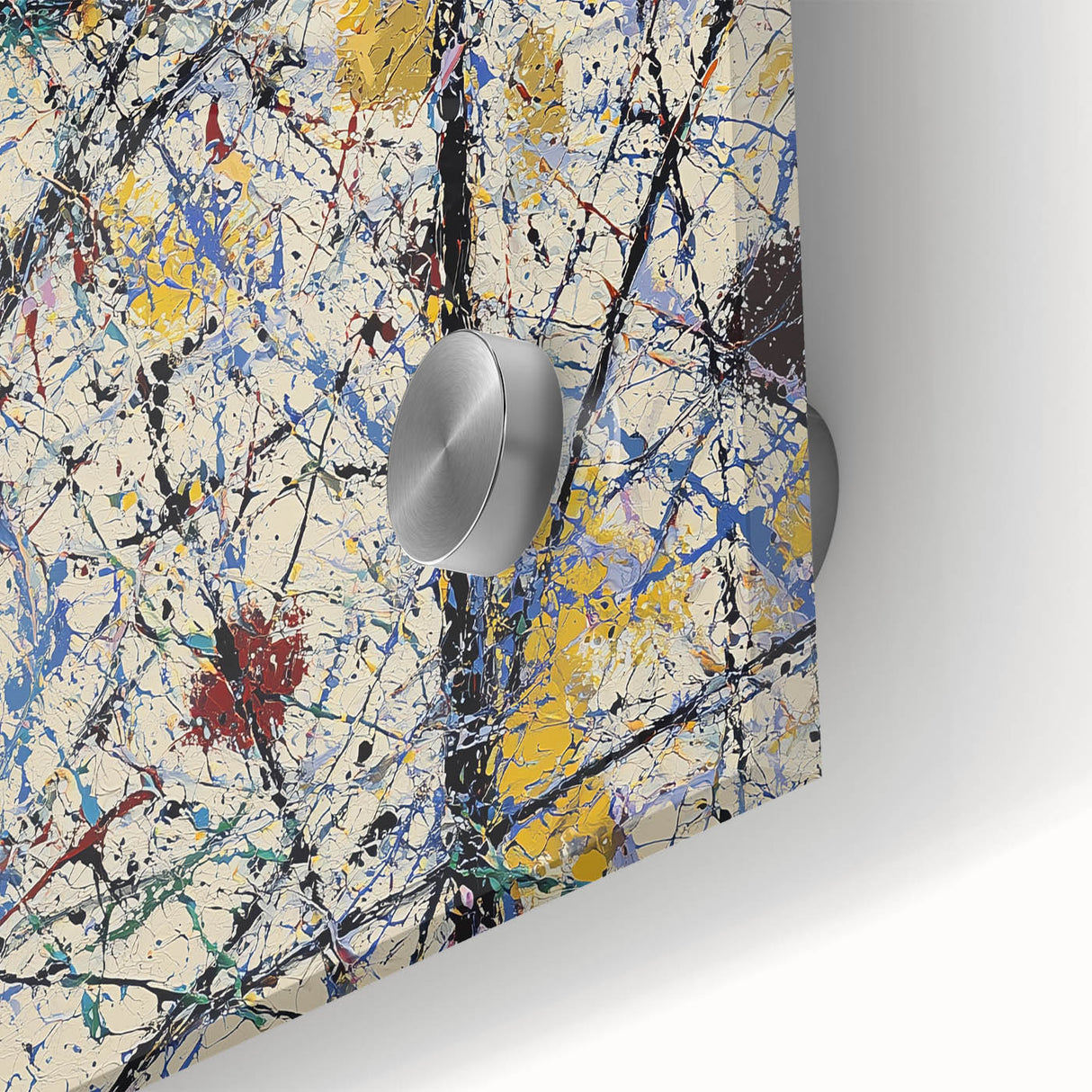 Close-up of an abstract acrylic glass artwork showcasing vibrant splatters in shades of blue, orange, and yellow, perfect for modern decor. This unique piece adds a dynamic touch to any space, highlighting contemporary artistic expression.