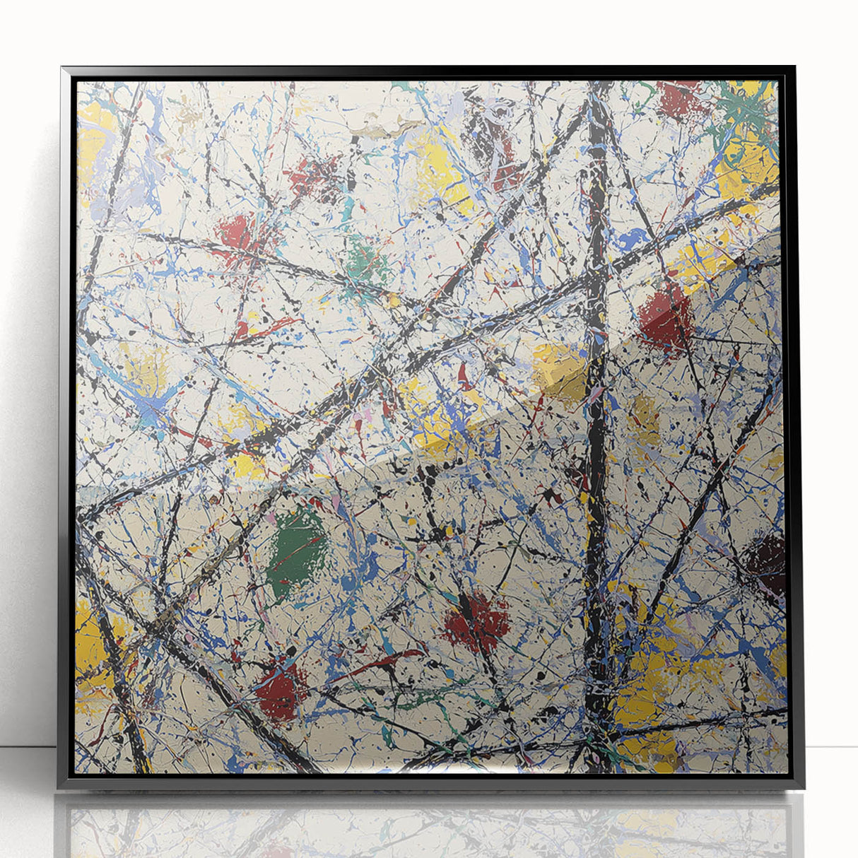 Framed acrylic artwork showcasing a modern abstract design with vibrant splatters of color on a sleek black background, perfect for contemporary home decor.