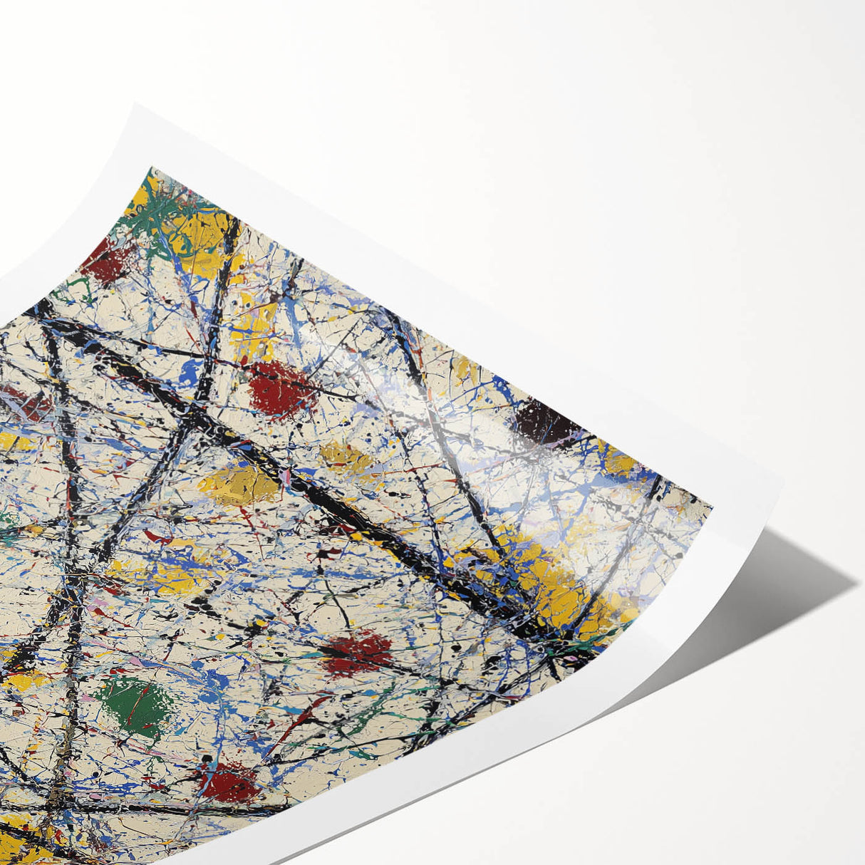 Abstract splatter artwork on rolled canvas, showcasing vibrant colors and dynamic patterns, ideal for modern home decor, presented in protective packaging.