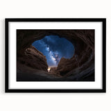 Framed landscape artwork depicting vibrant canyons in rich earth tones, featuring a sleek black mat and frame, ideal for enhancing home decor with natural beauty.